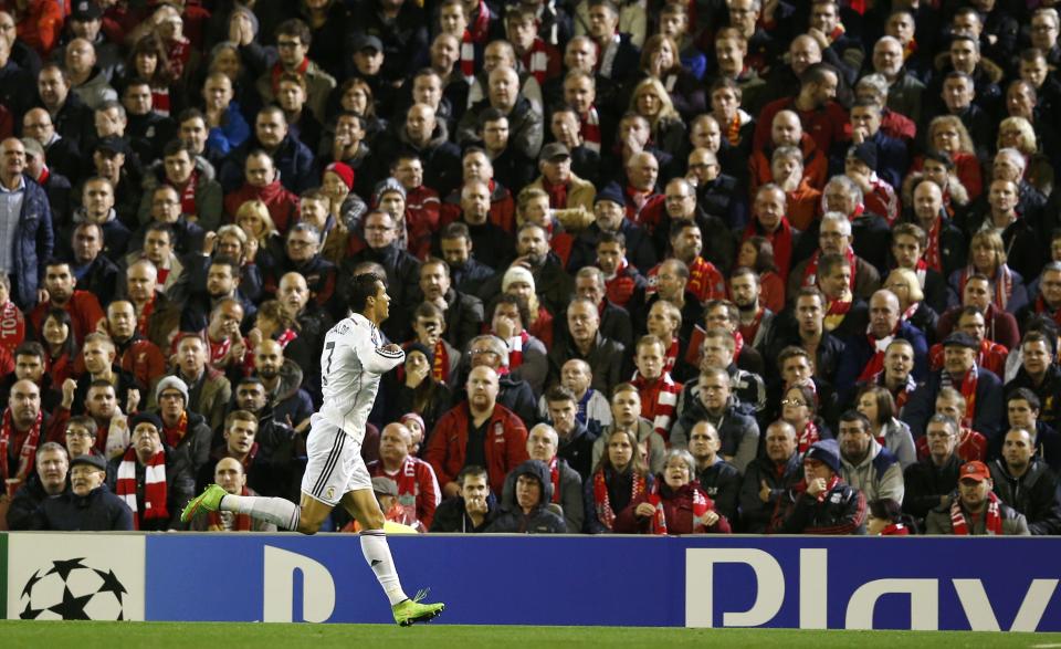Real Madrid's Cristiano Ronaldo celebrates after scoring a goal against Liverpool during their Champions League Group B soccer match at Anfield in Liverpool, northern England October 22, 2014. REUTERS/Phil Noble (BRITAIN - Tags: SOCCER SPORT)