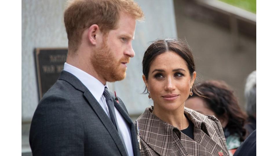 Prince Harry, Duke of Sussex and Meghan, Duchess of Sussex lay ferns and a wreath at the tomb of the Unknown Warrior at the newly unveiled UK war memorial and Pukeahu National War Memorial Park, on October 28, 2018, in Wellington, New Zealand. The Duke and Duchess of Sussex are on their official 16-day Autumn tour visiting cities in Australia, Fiji, Tonga and New Zealand. (Photo by Rosa Woods - Pool/Getty Images)