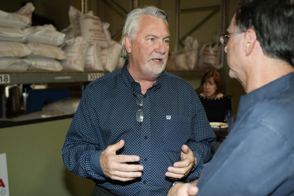 In this Thursday, June 9, 2022, photo, Joe O'Dea, a candidate for the Republican nomination to run against Democratic U.S. Senator Michael Bennet, talks during a campaign appearance at a brew pub in south suburban Littleton, Colo. (AP Photo/David Zalubowski)