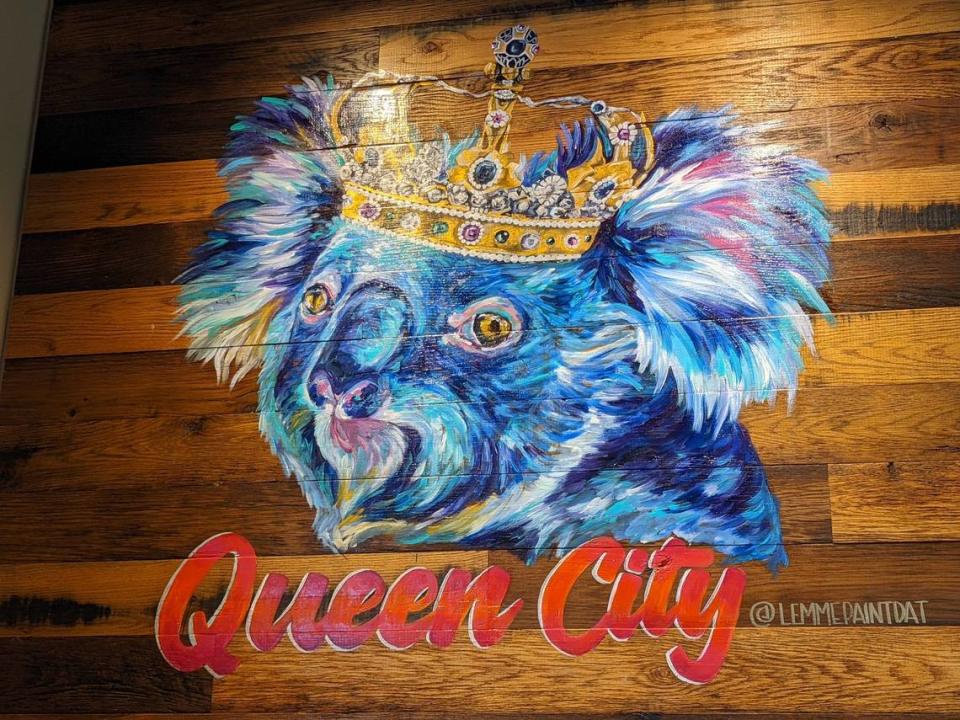 Charlotte artist Lindsey Jenneman, owner of Lemmepaintdat, painted the wall mural at Charlotte’s recently opened Steele Creek Outback Steakhouse.