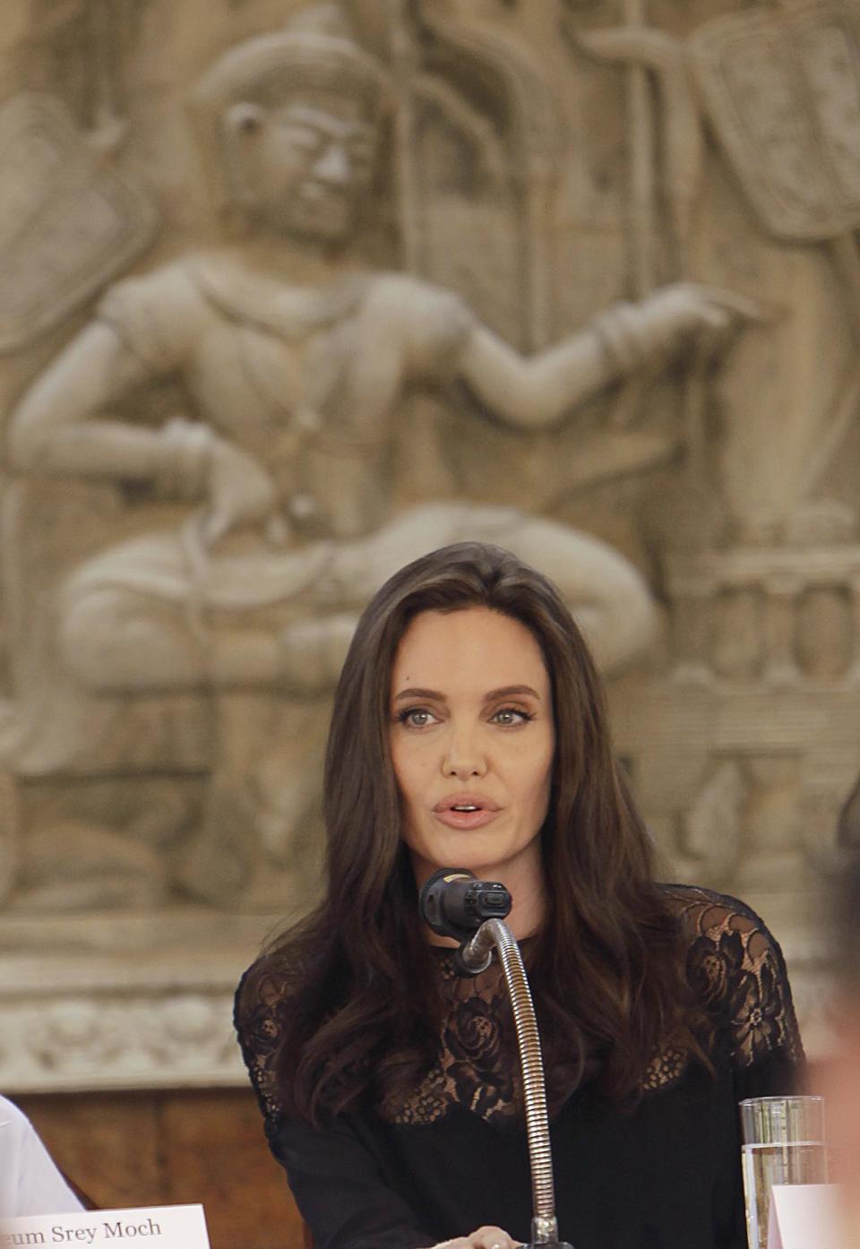 Hollywood actress Angelina Jolie holds a press conference in Siem Reap province, Cambodia, Saturday, Feb. 18, 2017. Jolie on Saturday launches her two-day film screening of "First They Killed My Father" in Angkor complex in Siem Reap province. (AP Photo/Heng Sinith)