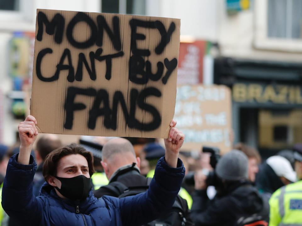 Chelsea fans protest against the European Super League (AP)