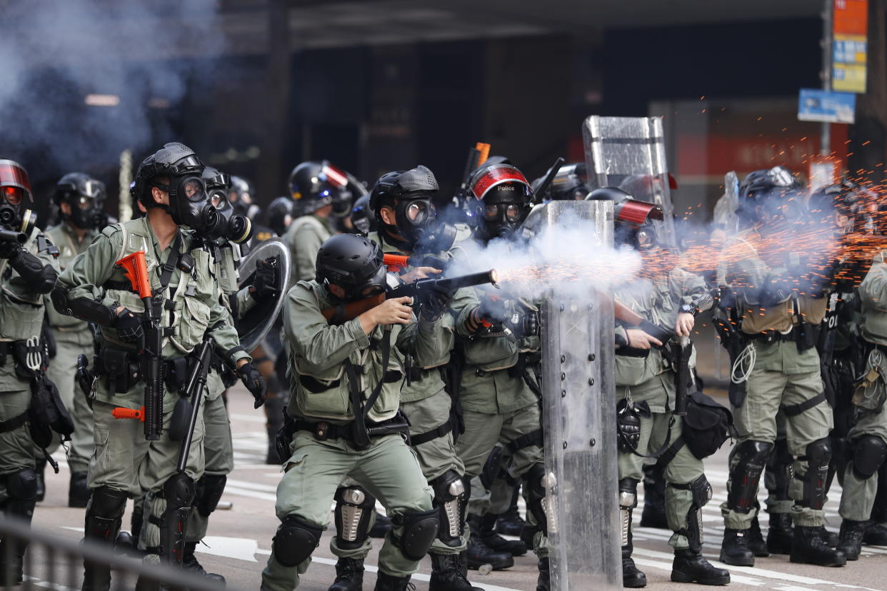 Police fire tear gas to disperse anti-government protesters in Hong Kong, Tuesday, Oct. 1, 2019. (Photo: Vincent Thian/AP)