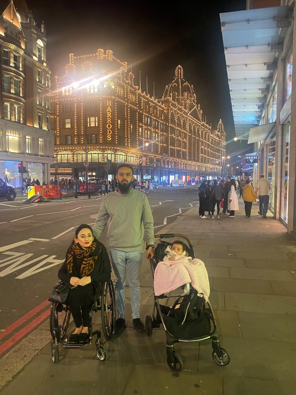 Mrs Ahmad (left, pictured with her husband Ather Amin and baby, Dua) hopes to inspire other people with disabilities who would like to give birth (Hira Ahmad)