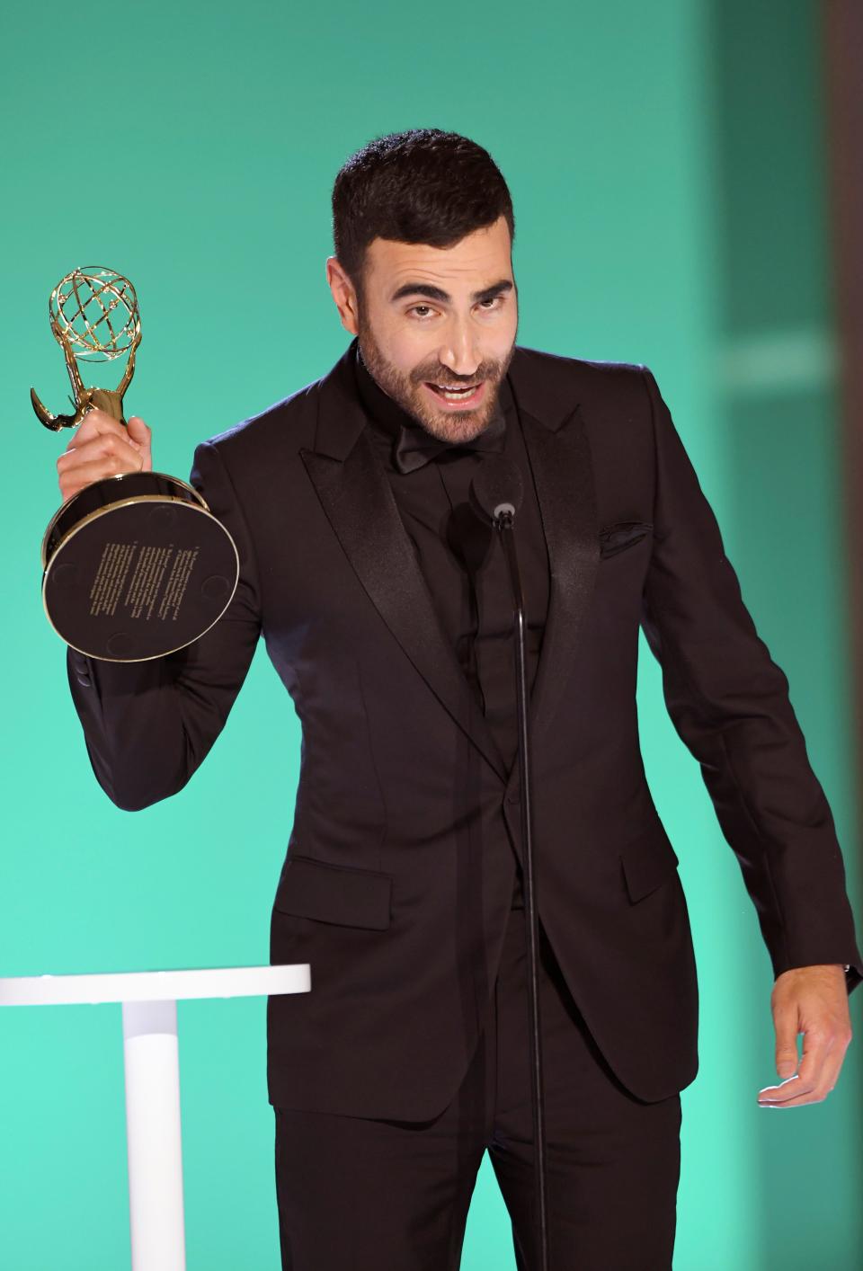 Brett Goldstein accepts the award for outstanding supporting actor in a comedy series for "Ted Lasso" at the 73rd Emmy Awards. Goldstein is co-creator with Bill Lawrence and star Jason Segal of "Shrinking," a new dramedy that explores grief through humor.