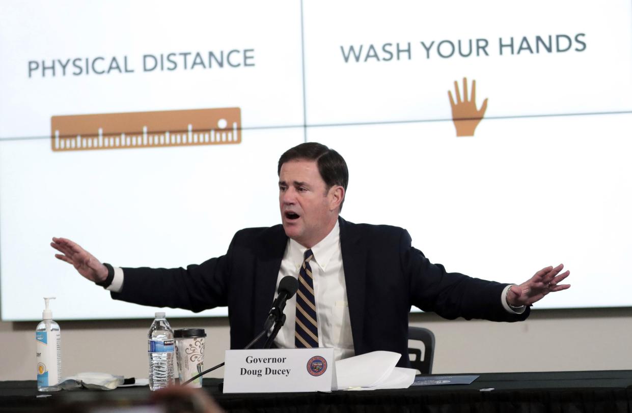 Gov. Doug Ducey updates reporters on the coronavirus pandemic during a news conference in Phoenix on June 29, 2020.