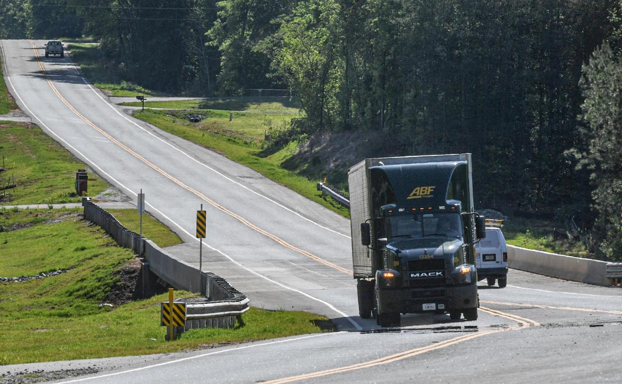 A truck passes over the completed bridge on US Highway 29 over Devil Fork Creek in Anderson County, S.C. April 2024.
