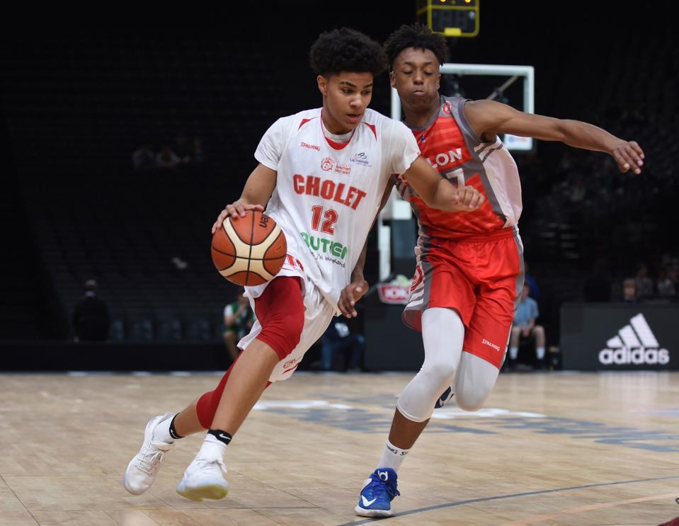 Cholet's Killian Hayes, left, drives during the French Cup under-17 final in Paris on April 22, 2017.