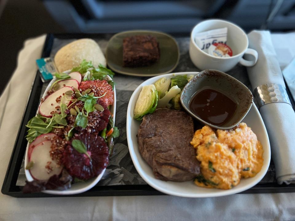 airplane food on iceland air - steak, salad, roll