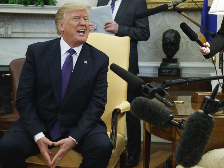 Donald Trump orders CNN's Jim Acosta 'out' of Oval Office after immigration questions