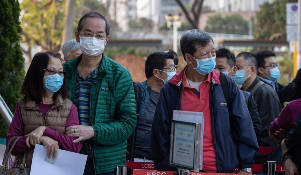 Hongkongers lining up to get vaccinated against the coronavirus. Photo: EPA-EFE