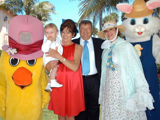 <p>Davidoff Studios/Getty </p> Barron Trump with his grandparents Amalija and Viktor Knavs during Easter Sunday events at the Mar-a-Lago club in Palm Beach, Florida, April 8, 2007.