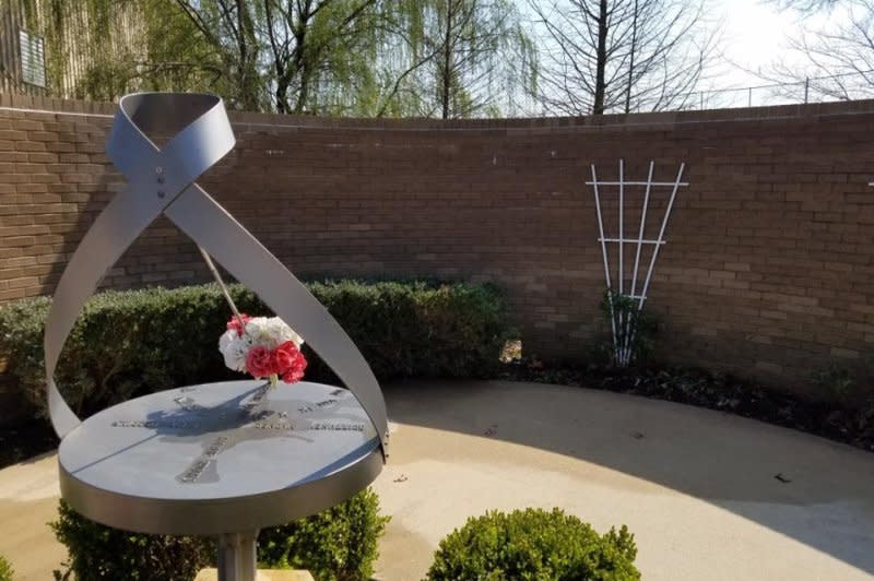 A memorial sculpture stands at Westside Middle School in Jonesboro, Ark., where, on March 23, 1998, four girls and a teacher were killed when two boys shot guns from a nearby wooded area. File Photo courtesy the Westside Consolidated School District