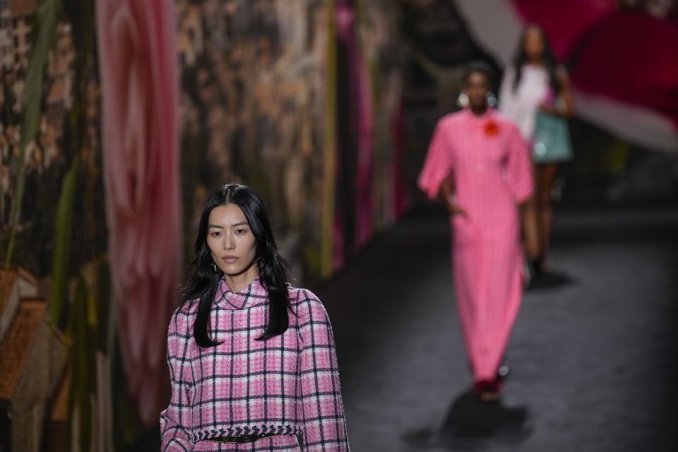 A model wears a creation for the Chanel Spring/Summer 2024 womenswear fashion collection presented Tuesday, Oct. 3, 2023 in Paris. (AP Photo/Christophe Ena)