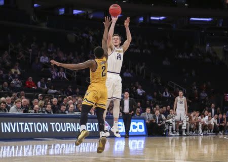 Apr 2, 2019; New York, NY, USA; Lipscomb Bisons guard Garrison Mathews (24) puts up a three point shot against the Wichita State Shockers in the first half of the NIT semifinals at Madison Square Garden. Mandatory Credit: Wendell Cruz-USA TODAY Sports
