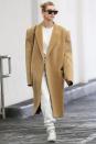 Hailey Baldwin keeps cozy in an oversized camel coat while out and about on Tuesday in L.A.