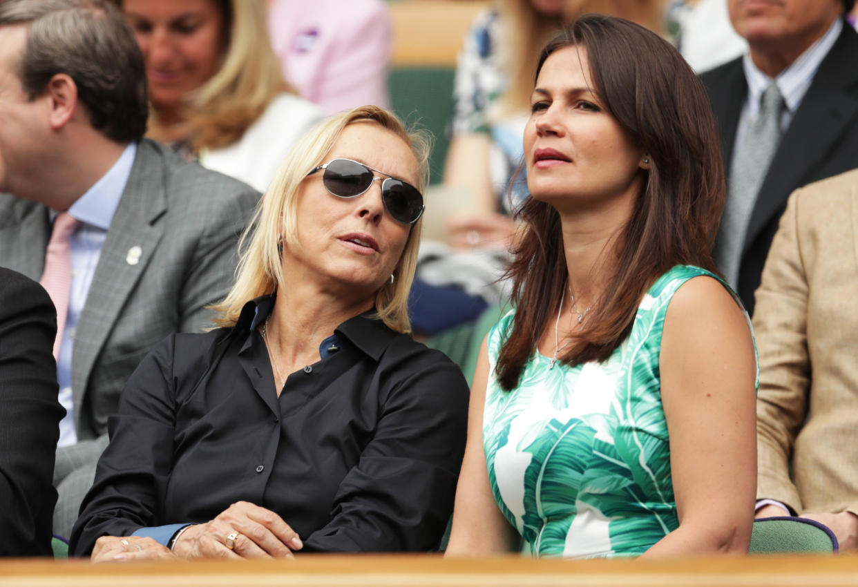 Julia Lemigova, right, and her wife Martina Navratilova watches the women's singles final between Serena Williams and Angelique Kerber at the Wimbledon Championships in Wimbledon, southwest London, on July 9, 2016. (Justin Tallis / AFP via Getty Images file)