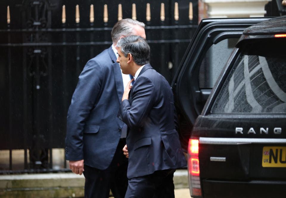 <p>Outgoing British Prime Minister Rishi Sunak walks outside Conservative Campaign Headquarters</p> (REUTERS)