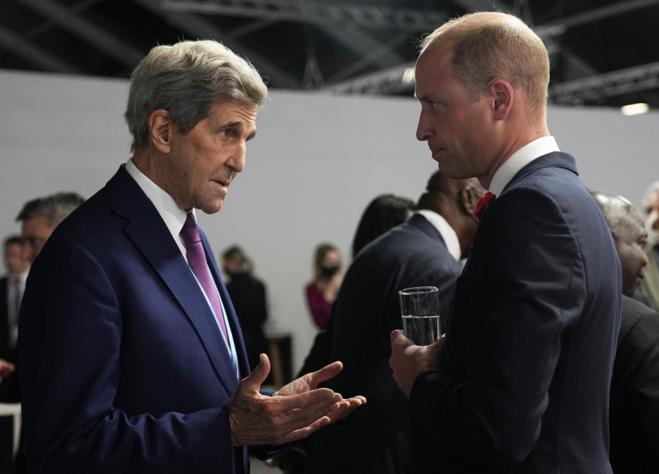 Britain's Prince William, right, speaks with John Kerry, United States Special Presidential Envoy for Climate, during a meeting with Earthshot prize winners and heads of state on the sidelines of the COP26 U.N. Climate Summit in Glasgow, Scotland, Tuesday, Nov. 2, 2021. The U.N. climate summit in Glasgow gathers leaders from around the world, in Scotland's biggest city, to lay out their vision for addressing the common challenge of global warming. (AP Photo/Alastair Grant, Pool)