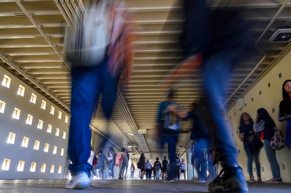 Students walk the halls between classes at Encina Preparatory School on Thursday, November 7, 2019 in Sacramento.