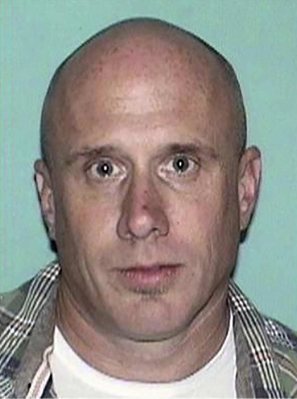 This undated photo released by the Gloucester County Prosecutor’s Office shows Sean Lannon. Authorities on Wednesday, March 10, 2021, searched for Lannon, a man wanted for questioning in a homicide in New Jersey and in the slayings of four people whose bodies were found inside a vehicle parked in a New Mexico airport garage. (Gloucester County Prosecutor’s Office via AP)