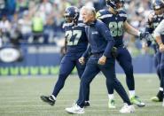 Sep 23, 2018; Seattle, WA, USA; Seattle Seahawks head coach Pete Carroll reacts following a touchdown against the Dallas Cowboys during the fourth quarter at CenturyLink Field. Mandatory Credit: Joe Nicholson-USA TODAY Sports