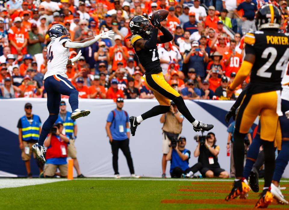 DENVER, COLORADO - SEPTEMBER 15: Cory Trice Jr. #27 of the Pittsburgh Steelers intercepts a pass intended for Courtland Sutton #14 of the Denver Broncos during the third quarter at Empower Field At Mile High on September 15, 2024 in Denver, Colorado. (Photo by Justin Edmonds/Getty Images)