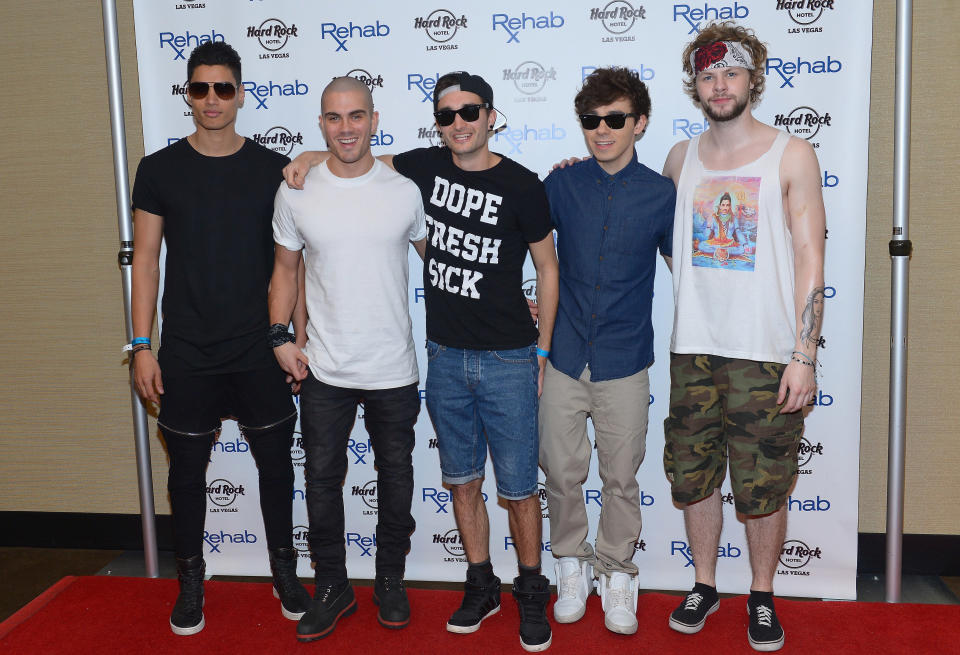 Siva Kaneswaran, Max George, Tom Parker, Nathan Sykes and Jay McGuiness of The Wanted  arrive at the Hard Rock Hotel &amp; Casino during the resort's Rehab pool party on April 27, 2014 in Las Vegas, Nevada.  (Photo by Bryan Steffy/Getty Images)