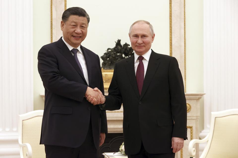 Chinese President Xi Jinping, left, and Russian President Vladimir Putin pose for a photo during their meeting at the Kremlin in Moscow, Russia, Monday, March 20, 2023. (Sergei Karpukhin, Sputnik, Kremlin Pool Photo via AP)