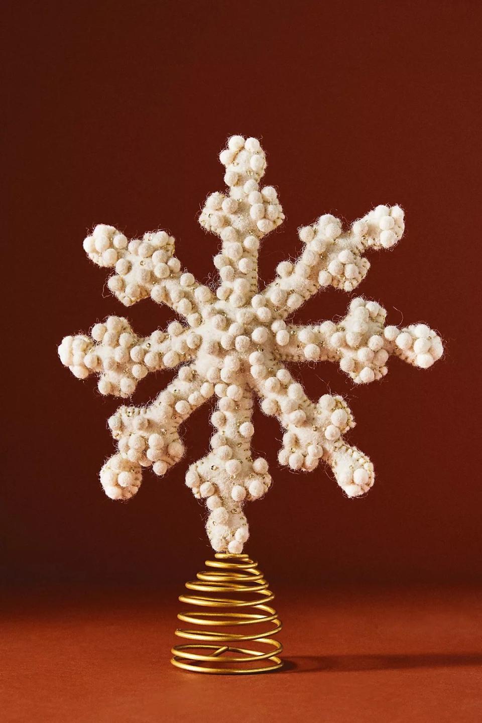 <p><a href="https://go.redirectingat.com?id=74968X1596630&url=https%3A%2F%2Fwww.anthropologie.com%2Fshop%2Fholly-pommed-snowflake-tree-topper2&sref=https%3A%2F%2Fwww.townandcountrymag.com%2Fleisure%2Fg42145590%2Fbest-christmas-tree-topper-ideas%2F" rel="nofollow noopener" target="_blank" data-ylk="slk:Shop Now;elm:context_link;itc:0;sec:content-canvas" class="link ">Shop Now</a></p><p>Holly Pommed Snowflake Tree Topper</p><p>anthropologie.com</p><p>$33.60</p>