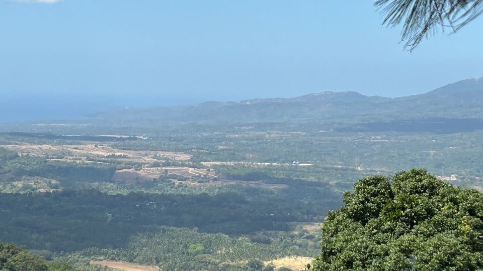 The Bataan Peninsula as seen from the Mount Samat National Shrine, a monument topped with a giant memorial cross in memory of US and Philippine dead in World War II. The South China Sea is in the background. - Brad Lendon/CNN