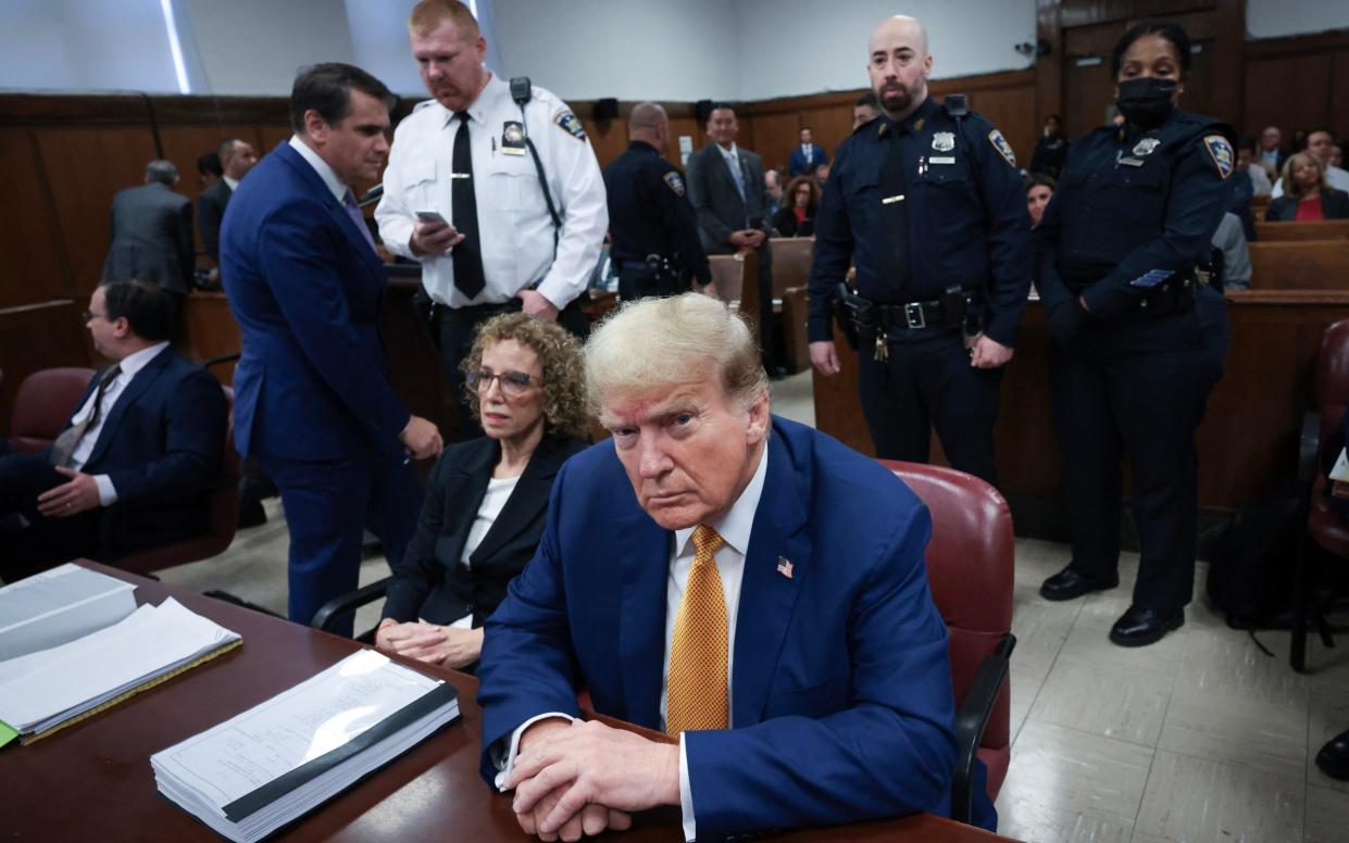 Donald Trump attends his trial for allegedly covering up hush money payments at Manhattan Criminal Court