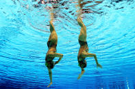 Eloise Amberger and Sarah Bombell of Australia compete in the Women's Duets Synchronised Swimming Free Routine Preliminary on Day 10 of the London 2012 Olympic Games at the Aquatics Centre on August 6, 2012 in London, England. (Photo by Clive Rose/Getty Images)