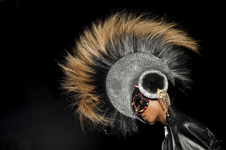 A model wears a design from the Philip Treacy Spring/Summer 2013 collection during London Fashion Week, Sunday, Sept. 16, 2012. (AP Photo/Jonathan Short)