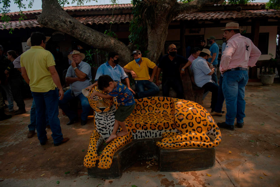 Farmers wait for a meeting with politicians on Sept. 19 to discuss the record fires in the Pantanal during the dry season.<span class="copyright">Mauro Pimentel—AFP/Getty Images</span>