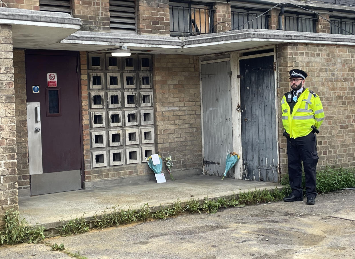 Police at the scene in Churchill Terrace, Chingford, east London, after 45-year-old James Markham was stabbed to death after confronting a group of youths.