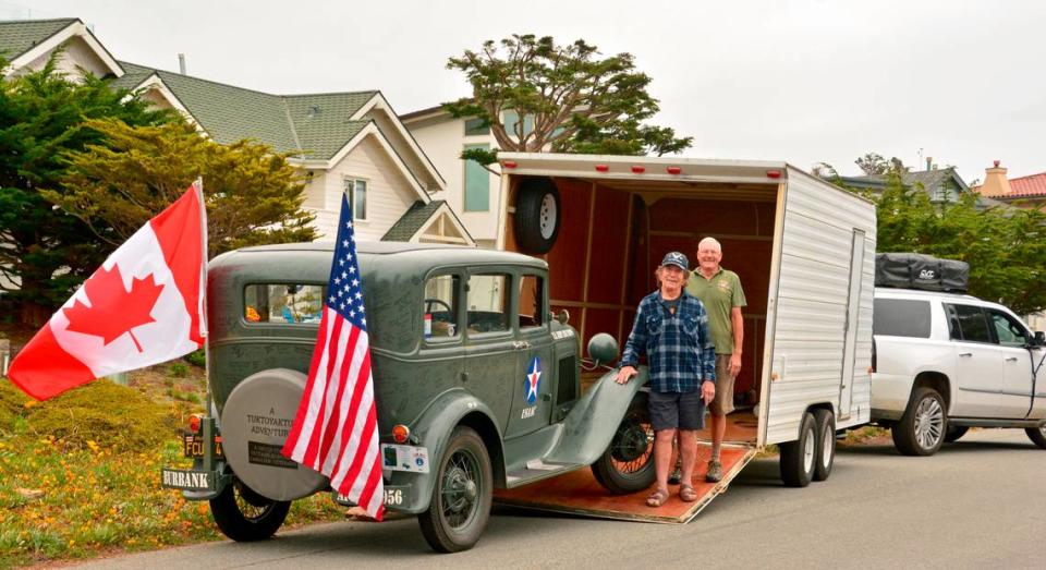 Jay Burbank of Cambria, at left, and Charlie Enxuto of South Carolina begin loading Friday, June 9, 2023, up for their 7,000-mile roundtrip adven ture to Tuktoyaktuk on the Arctic Ocean. They’ll do one-fifth of the journey driving Burbank’s 1931 Model A town sedan. That portion of the trip will be on the graveled Dempster Highway. Pat Burbank