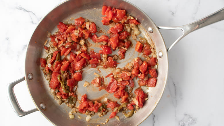 diced tomatoes in pan