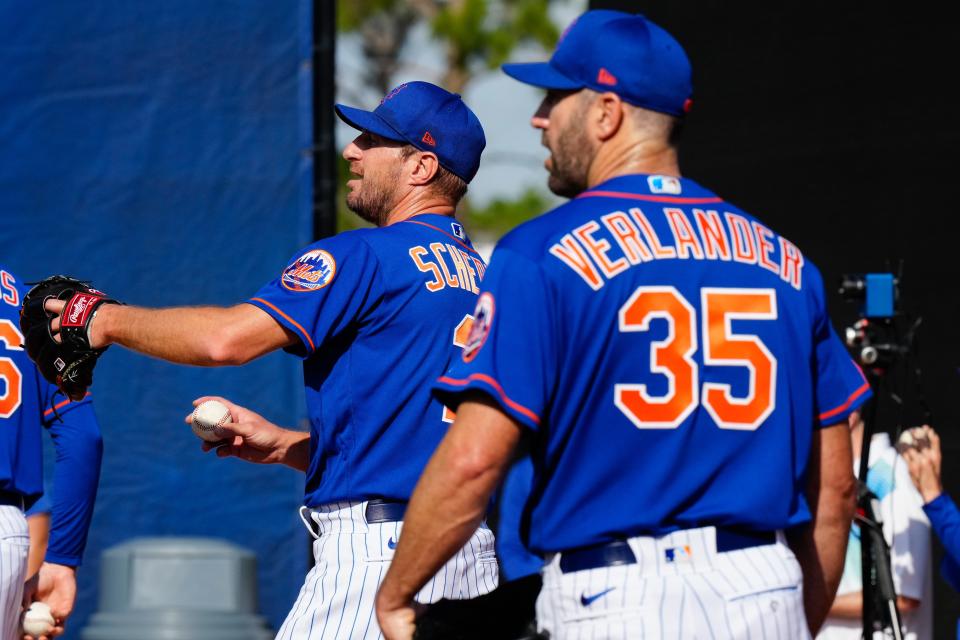 New York Mets pitchers Max Scherzer and Justin Verlander throw pitches in the bullpen during spring training workouts Feb. 17, 2023 in Port St. Lucie, Florida.