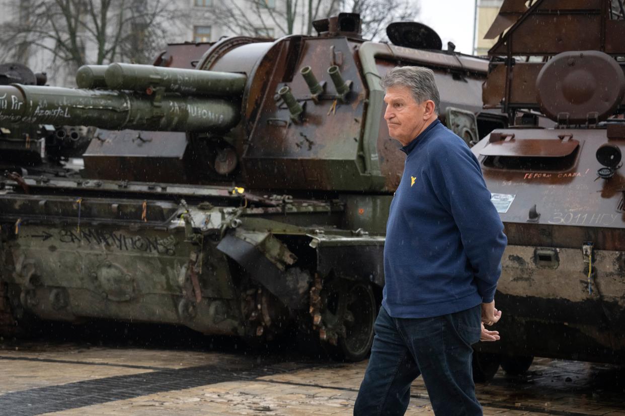 Manchin passes by damaged Russian tanks exhibited in central Kyiv (AP)