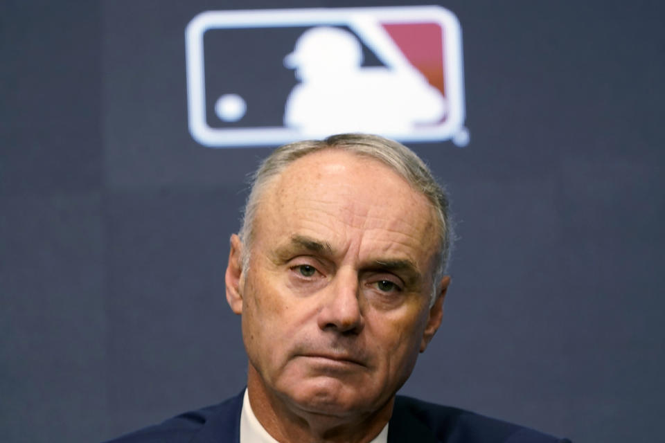 Major League Baseball commissioner Rob Manfred speaks during a news conference in Arlington, Texas, Thursday, Dec. 2, 2021. Owners locked out players at 12:01 a.m. Thursday following the expiration of the sport's five-year collective bargaining agreement. (AP Photo/LM Otero)