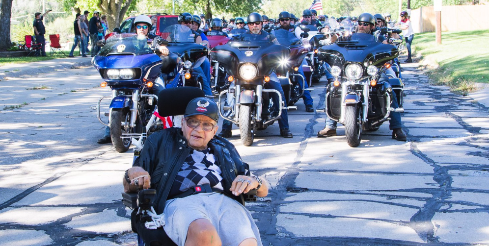 Veteran Bob Money leads hundreds of bikers for a victory lap. (Photo: Robert Todd Wilcke via Facebook)