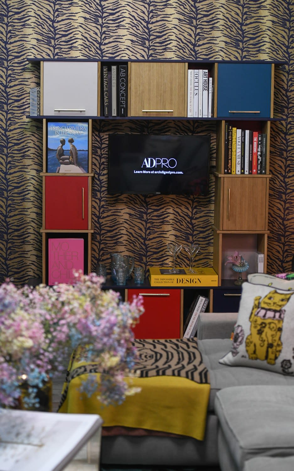 Bikoff adorned the custom Reform wall cabinet with brass Emtek hardware as well as books from Assouline and Abrams.