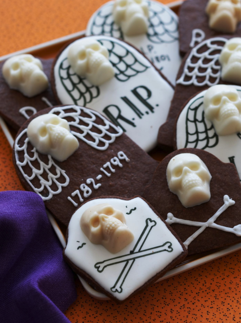 <p>These creepy cookies are made with chocolate butter cookie dough and molded white chocolate skulls.</p><p><a href="https://www.womansday.com/food-recipes/food-drinks/recipes/a11067/chocolate-tombstone-cookies-recipe-122454/" rel="nofollow noopener" target="_blank" data-ylk="slk:Get the Chocolate Tombstone Cookies recipe.;elm:context_link;itc:0;sec:content-canvas" class="link "><strong><em>Get the Chocolate Tombstone Cookies recipe.</em></strong></a></p>