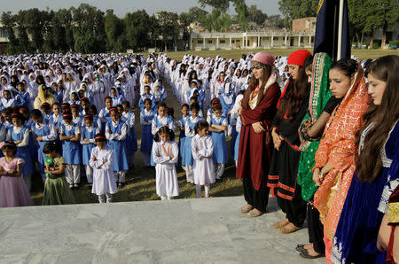 Students stand during morning assembly at the Islamabad College for girls in Islamabad, Pakistan, October 13, 2017. REUTERS/Caren Firouz