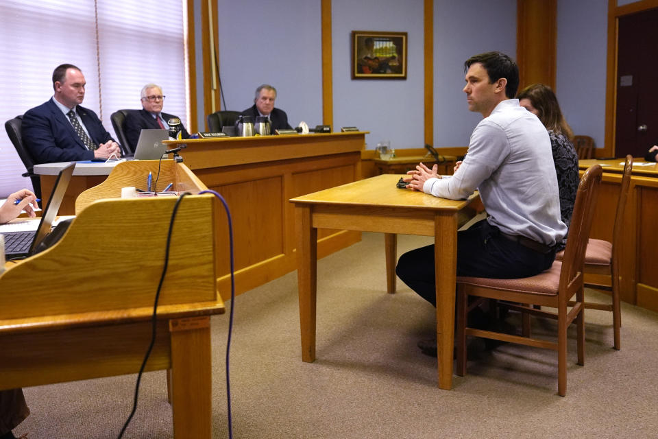 James Parker listens to the parole boards decision during his parole hearing, Thursday, April 18, 2024, in Concord, N.H. Parker who served more than half of his life in prison for his role in the 2001 stabbing deaths of two married Dartmouth College professors as part of a plan to rob and kill people before fleeing overseas has been granted parole. (AP Photo/Charles Krupa)