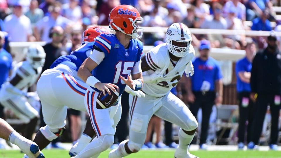 Mertz passes for 3 scores and runs for another to help Florida beat Mississippi State 45-28