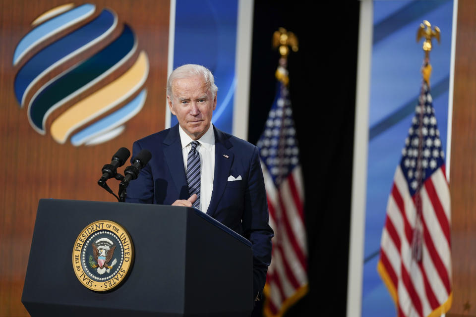 President Joe Biden answers questions from members of the media after delivering closing remarks to the virtual Summit for Democracy, in the South Court Auditorium on the White House campus, Friday, Dec. 10, 2021, in Washington. (AP Photo/Evan Vucci)