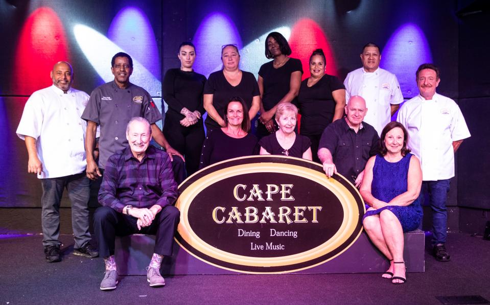 Owner Joel Notes, seated on left, is pictured with the staff at  Cape Cabaret on Vincennes Parkway in Cape Coral.