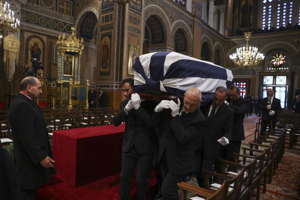 The coffin of former king of Greece Constantine II arrive for his funeral at Metropolitan Cathedral in Athens, Monday, Jan. 16, 2023. Constantine died in a hospital late Tuesday at the age of 82 as Greece's monarchy was definitively abolished in a referendum in December 1974. (Stoyan Nenov/Pool via AP)